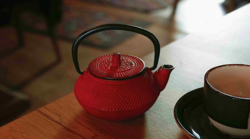 A cozy morning scene with a kettle and cup of coffee — representing peaceful living and simple lifestyle hacks by Lanem Dafi